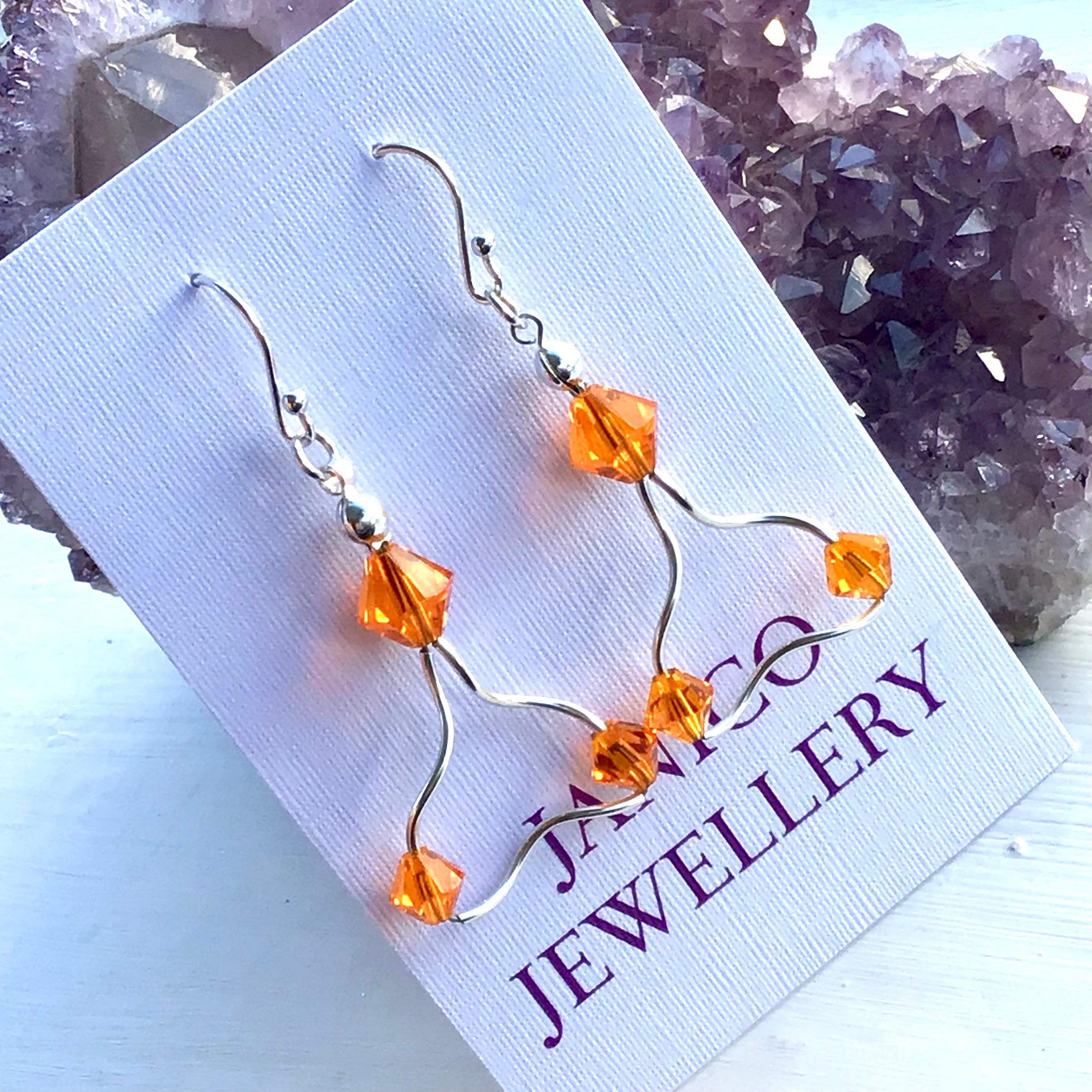 Orange swarovski 2025 crystal earrings