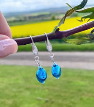 Load and play video in Gallery viewer, AQUAMARINE CUSHION LAMPWORK EARRINGS
